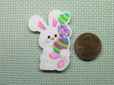 Second view of the Adorable Bunny Balancing Beautiful Easter Eggs Needle Minder