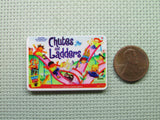 Second view of the Vintage Game Chutes and Ladders Needle Minder