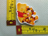 Third view of the Pooh and Tigger Needle Minder