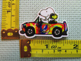 Third view of the Snoopy Driving a Colorful Convertible Car Needle Minder