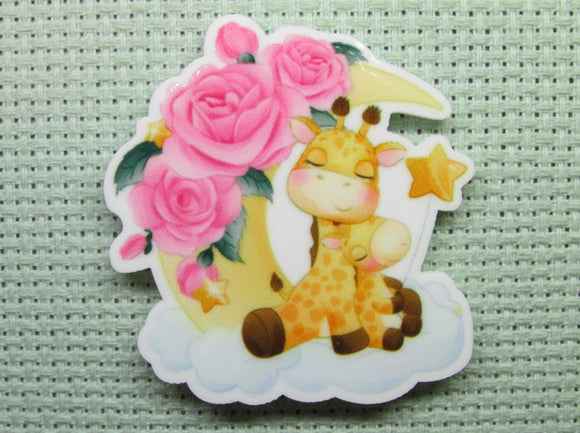 First view of the Adorable Giraffe Pair On a Cloudy Moon with Pink Flowers Needle Minder