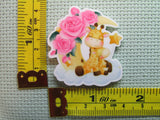 Third view of the Adorable Giraffe Pair On a Cloudy Moon with Pink Flowers Needle Minder