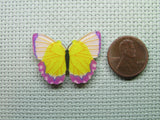 Second view of the Yellow and Purple Butterfly Needle Minder