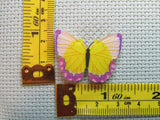 Third view of the Yellow and Purple Butterfly Needle Minder