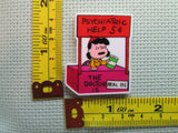 Third view of the Lucy's Psychiatric Help 5 Cents Needle Minder