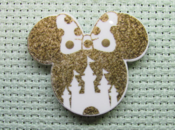 First view of the Small Gold Colored Mouse Head with White Castle and a Polka Dot Bow Needle Minder