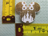 Third view of the Small Gold Colored Mouse Head with White Castle and a Polka Dot Bow Needle Minder