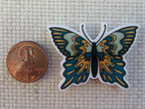 Second view of Green and Gold Butterfly Needle Minder.