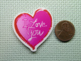 Second view of the I Love You Pink Heart Needle Minder