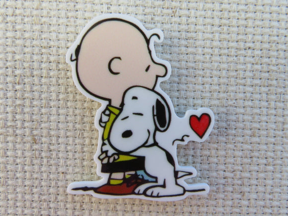 First view of Charlie Brown Receives a Hug From Snoopy Needle Minder.