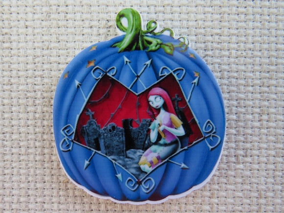 First view of Sally in a Blue Pumpkin Needle Minder.