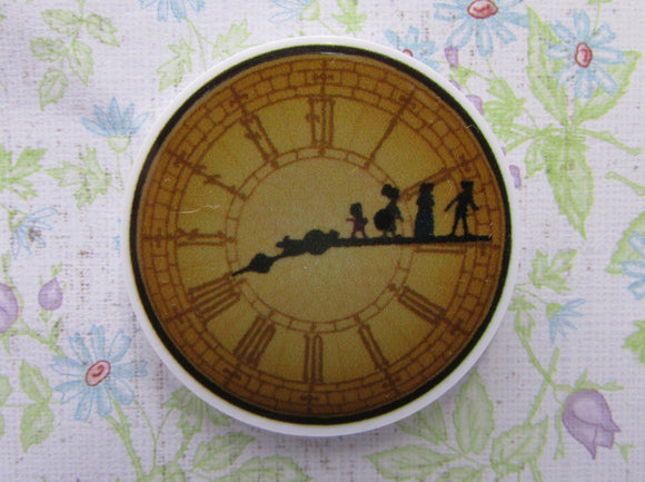 First view of the Peter Pan, Wendy, John, and Michael on the Face of the Clock Needle Minder