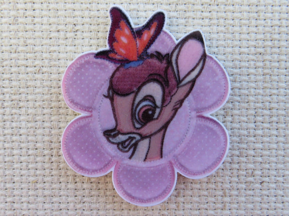 First view of Bambi in a flower needle minder.