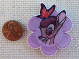 Second view of Bambi in a flower needle minder.