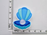 Fourth view of the Blue Clam Shell with a Pearl Inside Needle Minder