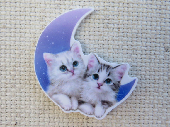 First view of Two White Kitties in a Blue Moon Needle Minder.