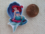 Second view of Ariel Sitting in a Shell Needle Minder.