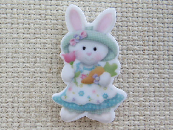 First view of beautifully dressed bunny Needle Minder.