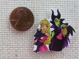 Second view of Aurora Has a Stuffed Dragon and Maleficent has an Aurora Doll Needle Minder.