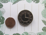 Second view of the Bronze Colored Clock Needle Minder