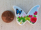 Second view of Blue Butterfly Fluttering Over Daisies Needle Minder.