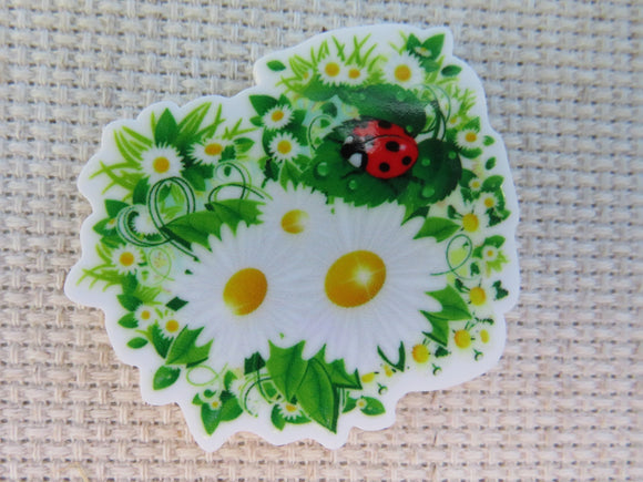 First view of Daisies and a Ladybug Needle Minder.