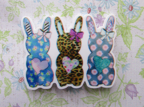 First view of the A Trio of Colorful Bunnies with Hearts Needle Minder