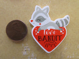 Second view of the Raccoon Love Bandit Needle Minder