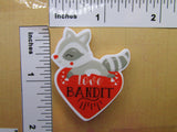 Third view of the Raccoon Love Bandit Needle Minder