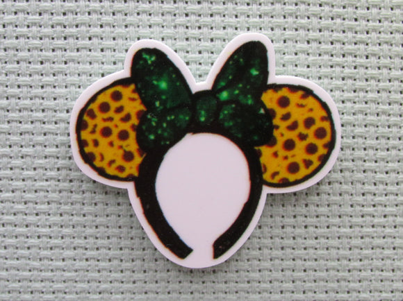 First view of the Animal Print Mouse Ears with a Green Bow Needle Minder