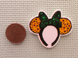 Second view of the Animal Print Mouse Ears with a Green Bow Needle Minder