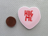 Second view of the Hug Me Conversation Heart Needle Minder