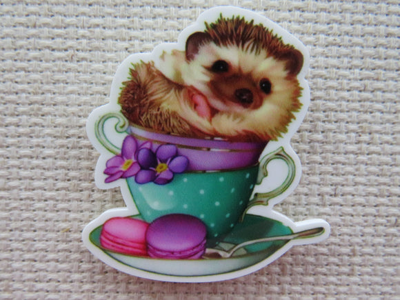 First view of Hedgehog Sitting Atop a Stack of Teacups Needle Minder.