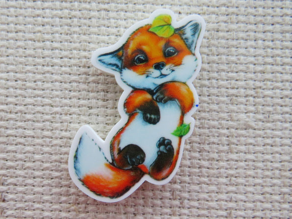 First view of Playful Fox on her Back Needle Minder.