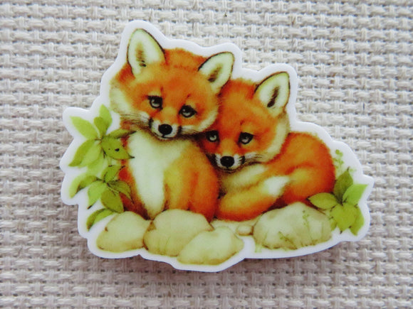 First view of A Pair of Foxes Needle Minder.
