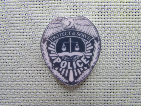 First view of the Police Shield Needle Minder