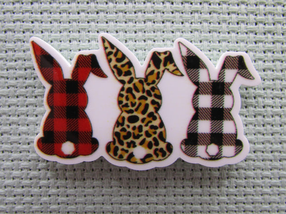 First view of the A Trio of Checkered/Animal Print Bunnies Needle Minder