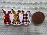 Second view of the A Trio of Checkered/Animal Print Bunnies Needle Minder