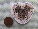 Second view of the Animal Print Mouse Head in a Bed of Sunflowers Needle Minder