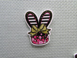 First view of the Black and White Stripped Floral Bunny Head Needle Minder
