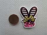 Second view of the Black and White Stripped Floral Bunny Head Needle Minder