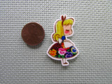 Second view of the Alice in a Floral Dress Needle Minder