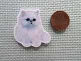 Second view of the Pretty White Cat Needle Minder
