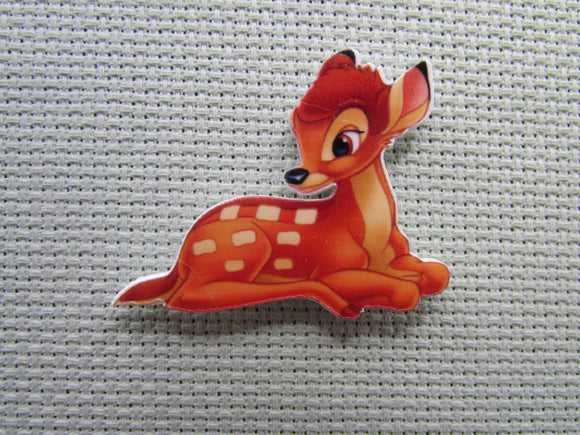 First view of the Young Bambi Laying Down Needle Minder