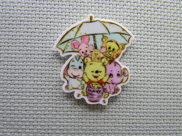 First view of the Pooh Bear and Friends Under an Umbrella Needle Minder