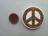 Second view of the Colorful Peace Sign Needle Minder