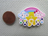 Second view of the Funshine Bear with Loving Clouds and a Rainbow Needle Minder