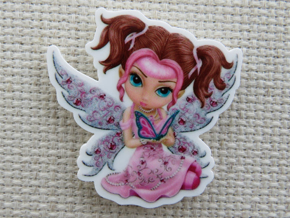 First view of Pink Fairy with a Pretty Butterfly Needle Minder.