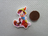 Second view of the Pinocchio with Figaro Watercolor Needle Minder