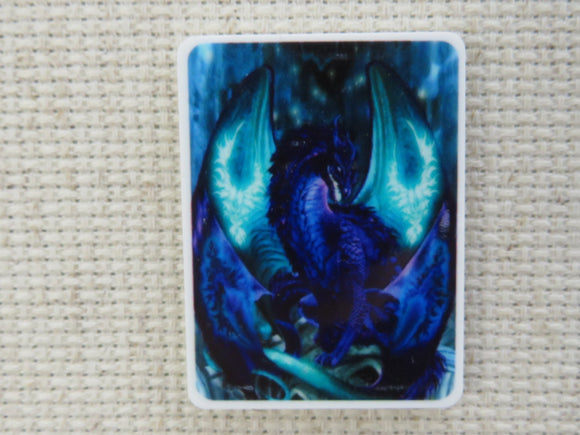 First view of blue and green dragon needle minder.